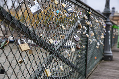 Paris - Padlocks fixed by Lovers to Bridge over River Seine
