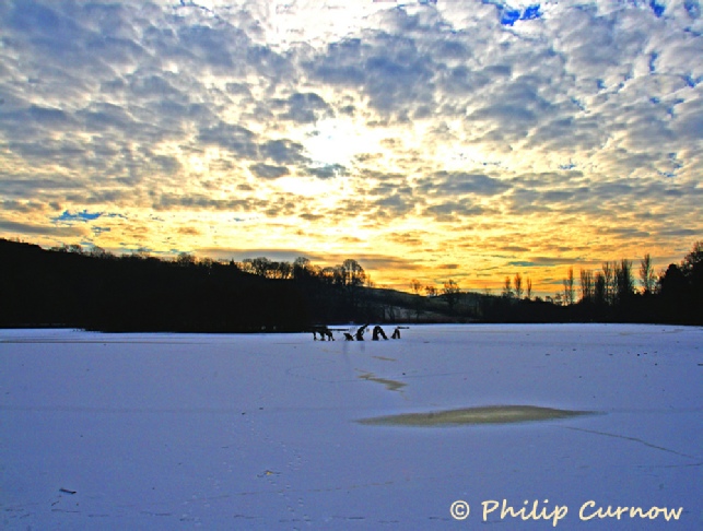 Sunrise over a a Frozen Llandrindod Lake - and to appreciate the beauty of our world, whatever the weather.